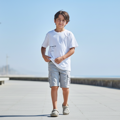 Polo Niño Boxy Keep Moving Blanco – 100% Algodón